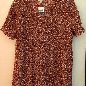 Pretty ruched top. Ruching from neck to under bust. Then it flares out